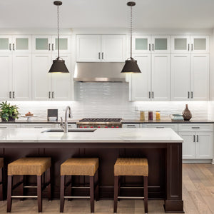 2 Wyndham pendants hanging above a kitchen island..