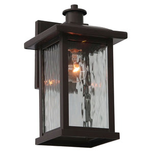 Ashburn small outdoor light lit.